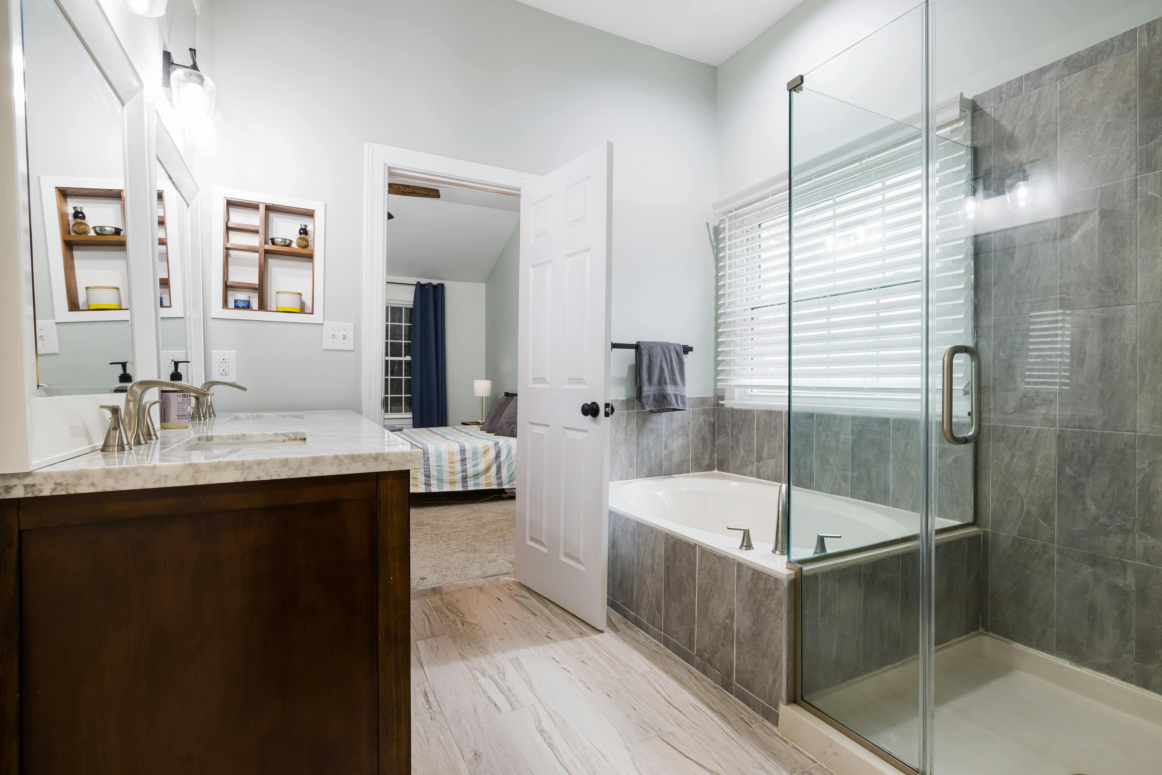 Master bathroom renovation with glass shower and soaking tub